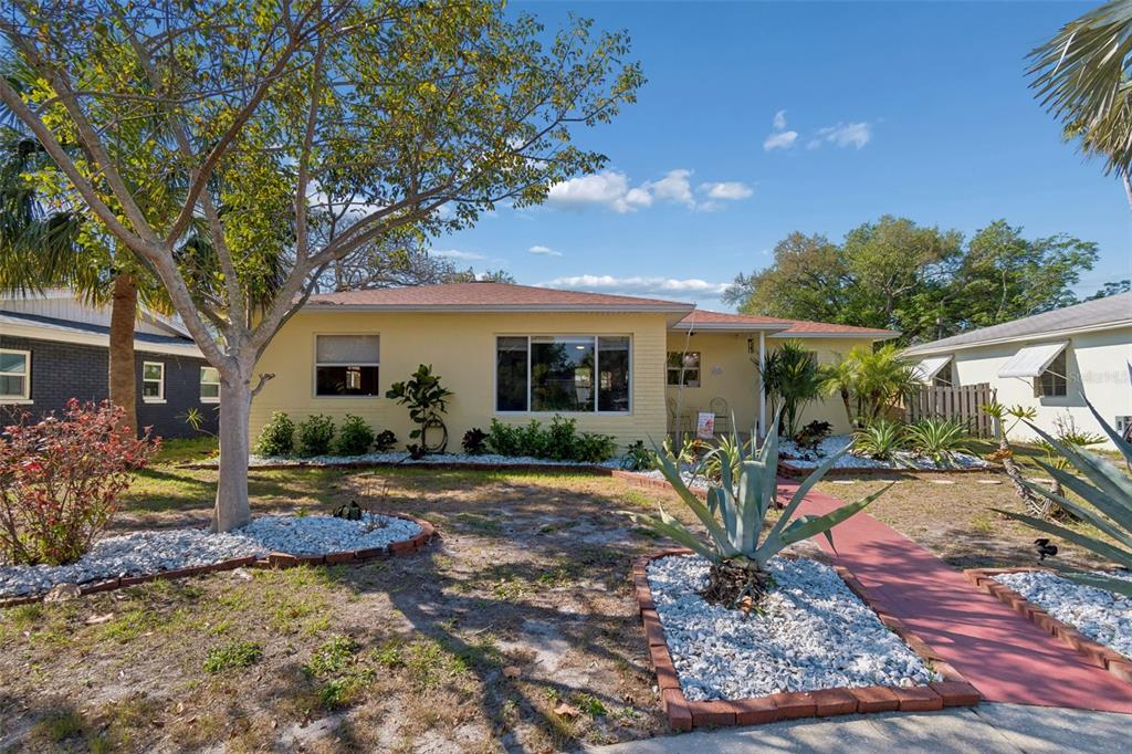 front view of a house with a patio
