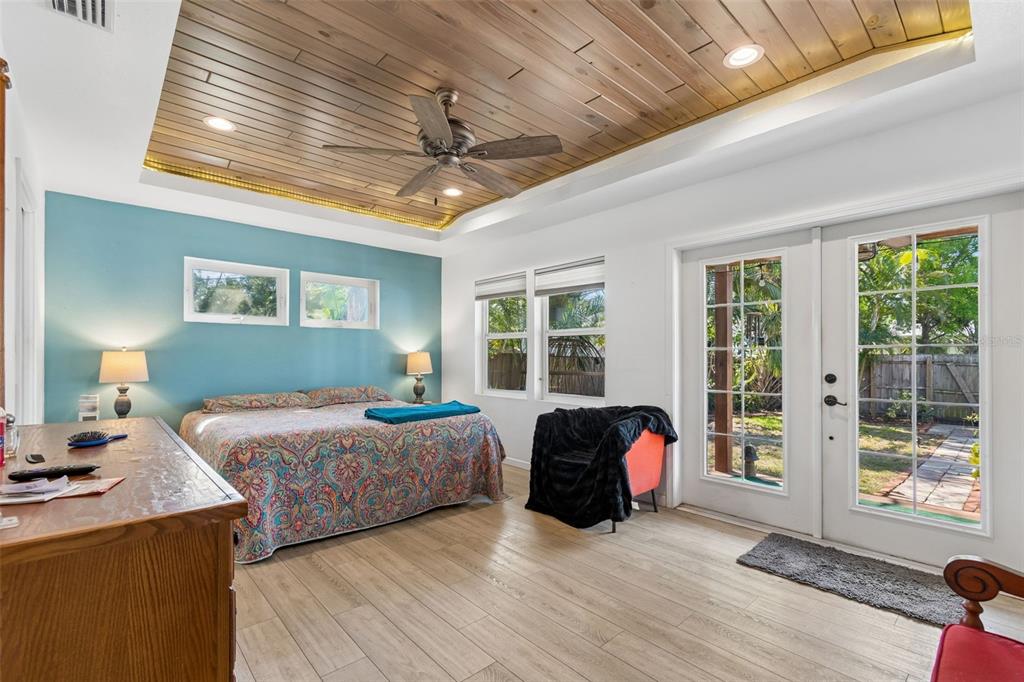 6226 8th Avenue South Gulfport, FL 33707 - Photo 17 of 46 a bedroom with a bed and a large window