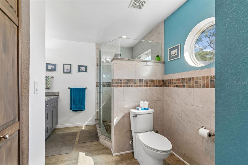 6226 8th Avenue South Gulfport, FL 33707 - Photo 20 of 46 a bathroom with a toilet and a sink