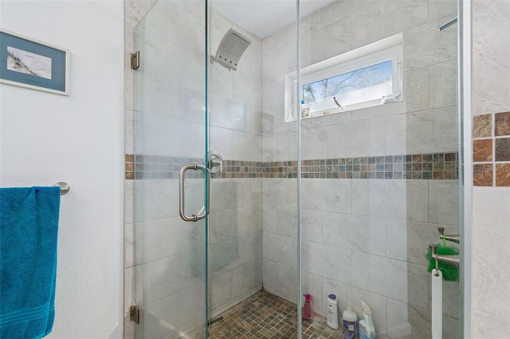 6226 8th Avenue South Gulfport, FL 33707 - Photo 22 of 46 a bathroom with a shower