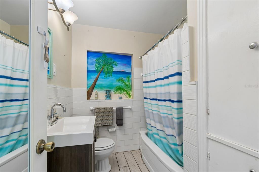 6226 8th Avenue South Gulfport, FL 33707 - Photo 26 of 46 a bathroom with a sink toilet and shower