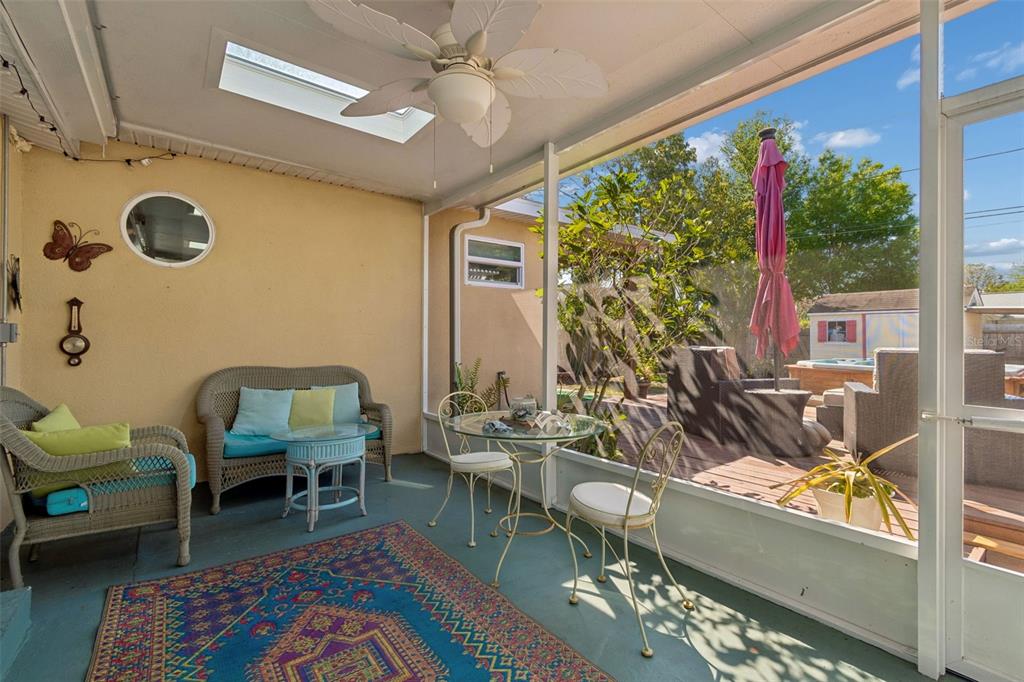 6226 8th Avenue South Gulfport, FL 33707 - Photo 33 of 46 a living room with furniture and a large window