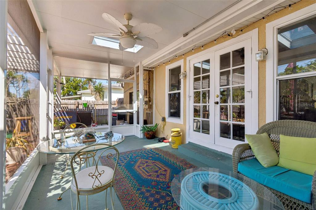 6226 8th Avenue South Gulfport, FL 33707 - Photo 34 of 46 a living room with furniture and a large window
