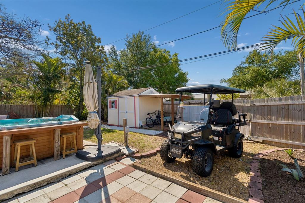 6226 8th Avenue South Gulfport, FL 33707 - Photo 41 of 46 a view of a patio with table and chairs under an umbrella
