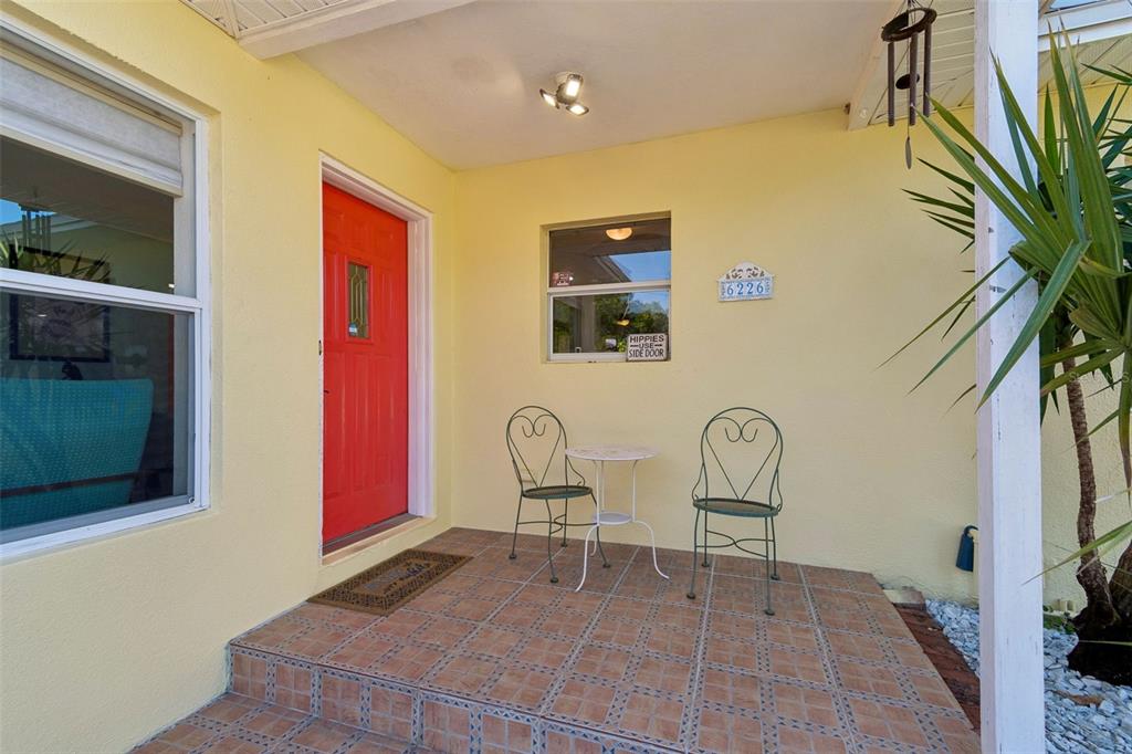 6226 8th Avenue South Gulfport, FL 33707 - Photo 5 of 46 a view of a room with chairs and potted plant