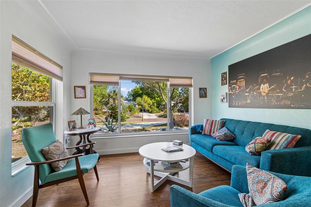 6226 8th Avenue South Gulfport, FL 33707 - Photo 7 of 46 a living room with furniture and a large window