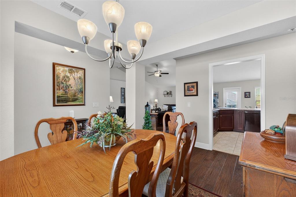 2429 Twin Lake View Road Winter Haven, FL 33881 - Photo 7 of 37 a view of a dining room with furniture