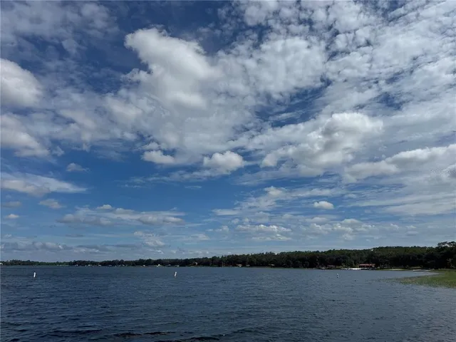 a view of swimming pool and mountain in back