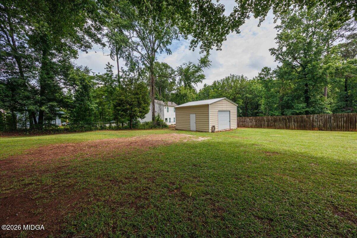 557 Aarons Circle Gray, GA 31032 - Photo 32 of 36 a house view with a outdoor space