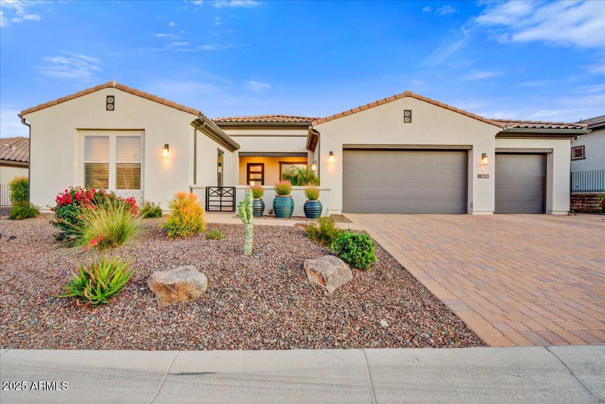 17833 East StockingTrail Rio Verde, AZ 85263 - Photo 1 of 45 a front view of a house with a yard and garage