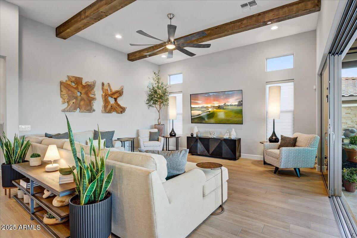 17833 East StockingTrail Rio Verde, AZ 85263 - Photo 11 of 45 a living room with furniture and a flat screen tv