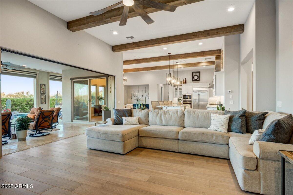 17833 East StockingTrail Rio Verde, AZ 85263 - Photo 13 of 45 a living room with furniture and a large window