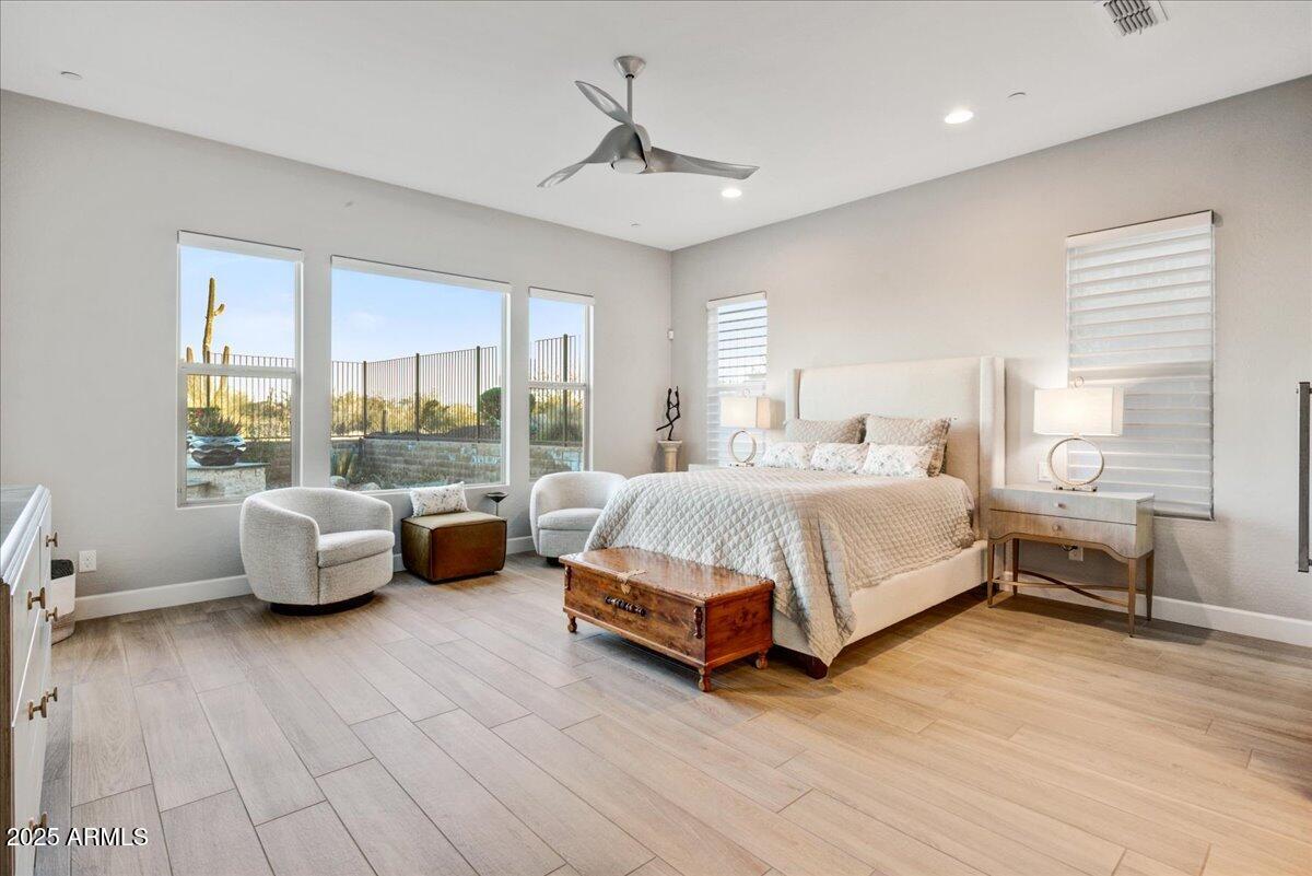 17833 East StockingTrail Rio Verde, AZ 85263 - Photo 15 of 45 a bedroom with a bed and a couch