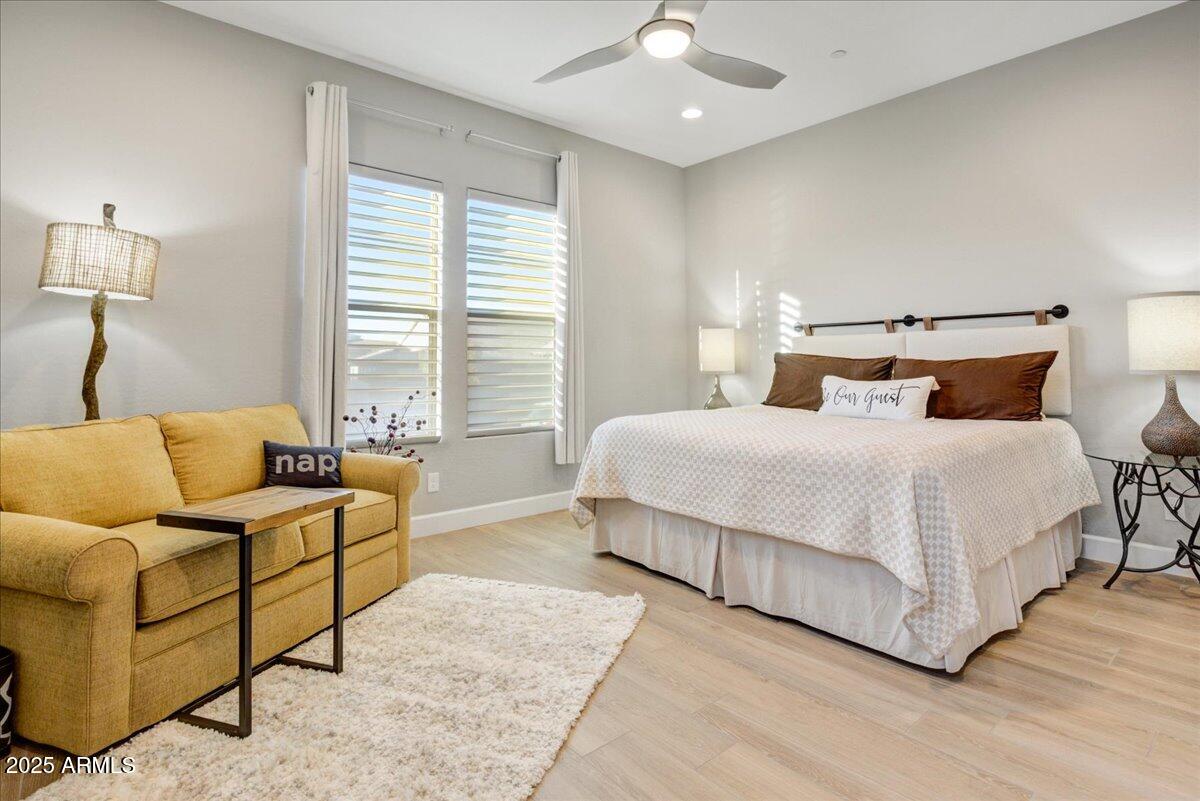 17833 East StockingTrail Rio Verde, AZ 85263 - Photo 21 of 45 a bedroom with a bed and lamp