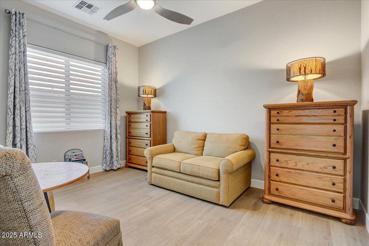 17833 East StockingTrail Rio Verde, AZ 85263 - Photo 24 of 45 a living room with furniture and a chair