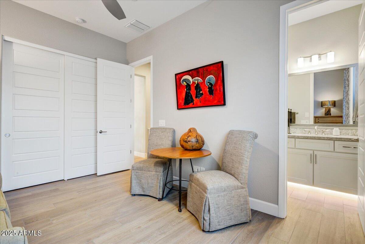 17833 East StockingTrail Rio Verde, AZ 85263 - Photo 25 of 45 a living room with furniture and wooden floor