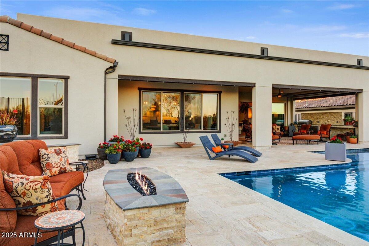 17833 East StockingTrail Rio Verde, AZ 85263 - Photo 32 of 45 a outdoor space with patio furniture and a potted plant