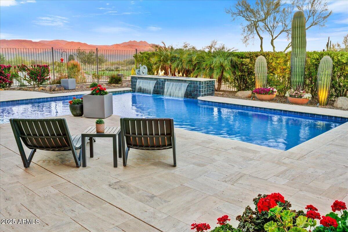 17833 East StockingTrail Rio Verde, AZ 85263 - Photo 33 of 45 a view of a chairs and table on the terrace