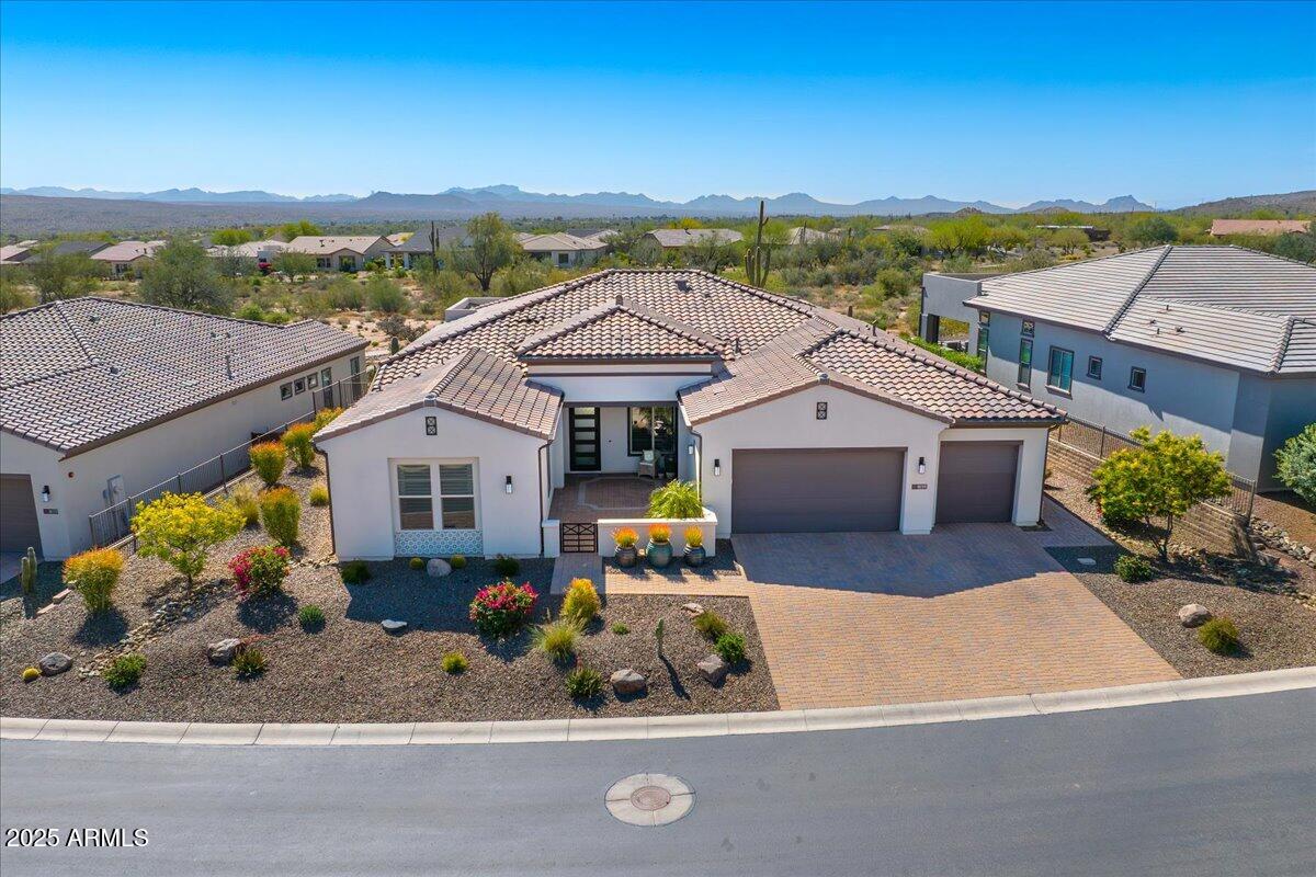 17833 East StockingTrail Rio Verde, AZ 85263 - Photo 34 of 45 an aerial view of a house with a yard basket ball court and a lake view