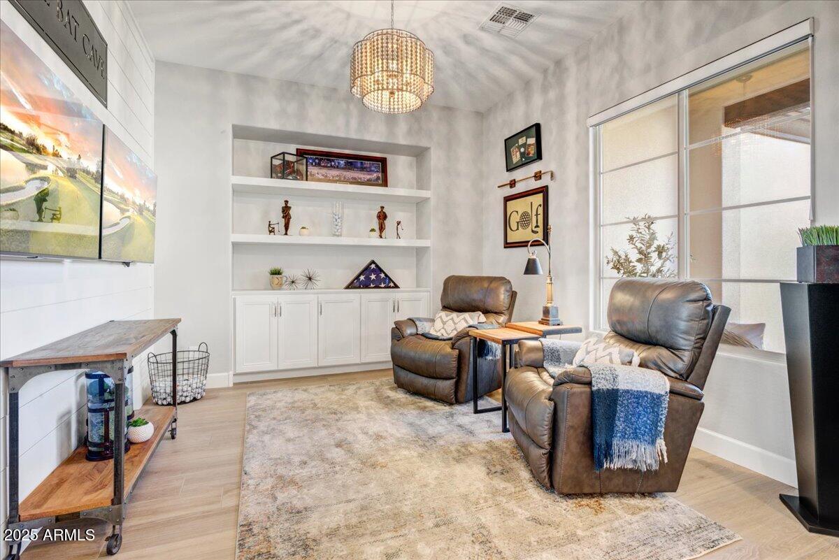 17833 East StockingTrail Rio Verde, AZ 85263 - Photo 4 of 45 a living room with fireplace furniture and a window