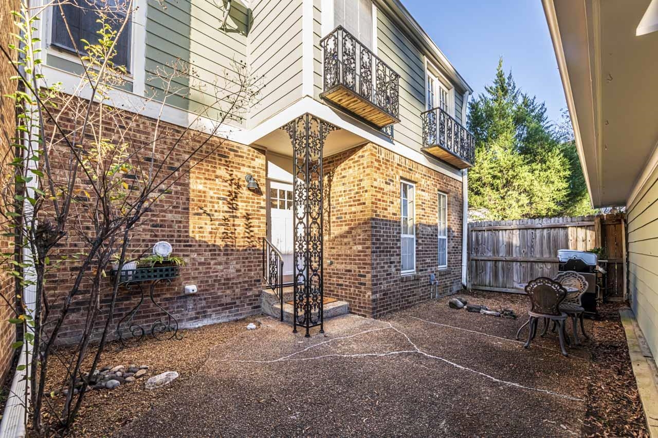 Doorway to property and front patio area