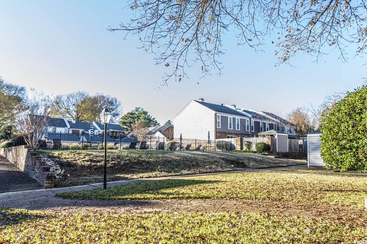 6910 Petworth Road, Unit 6910 Memphis, TN 38119 - Photo 1 of 37 a front view of a house with a yard