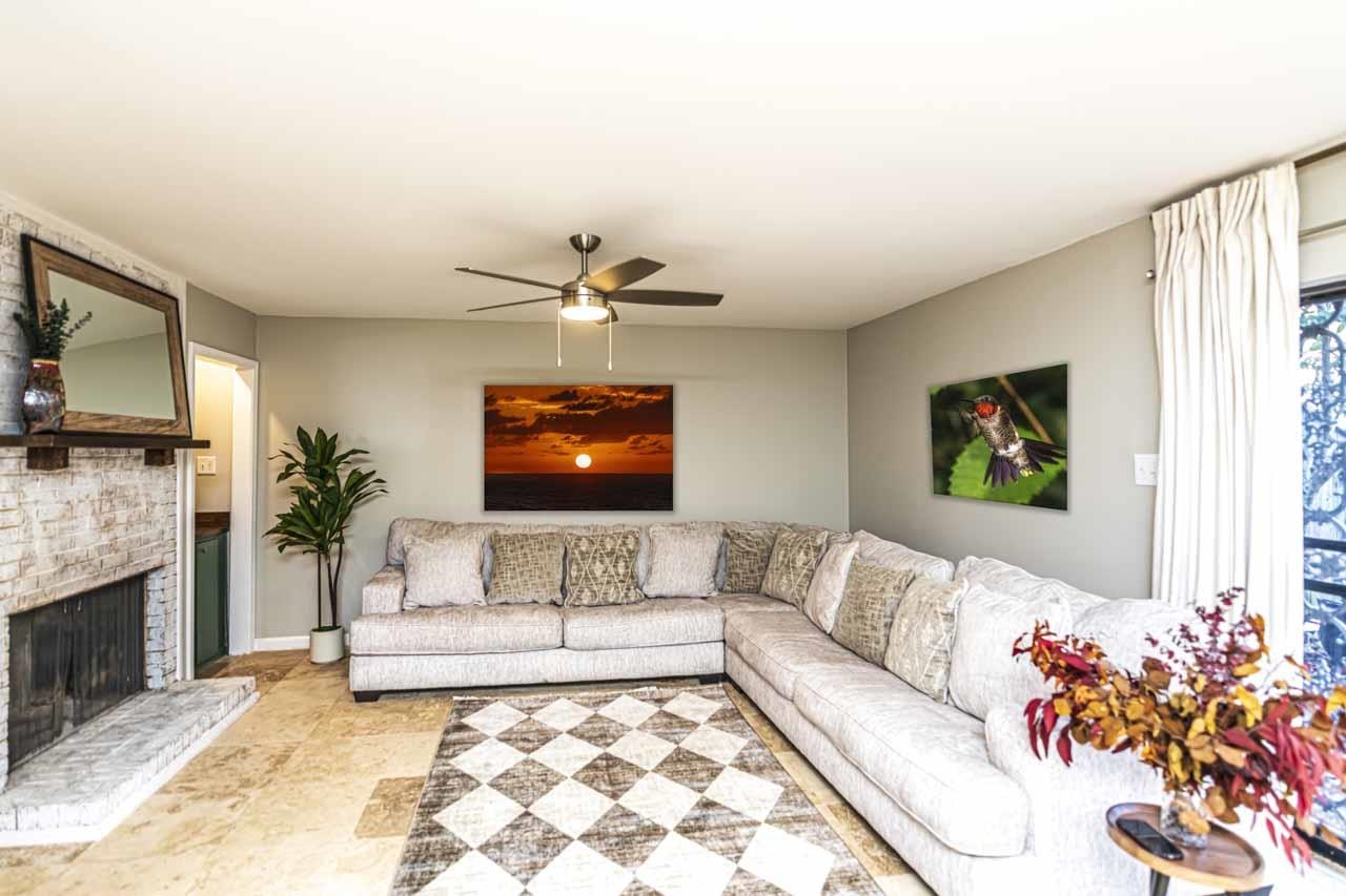 6910 Petworth Road, Unit 6910 Memphis, TN 38119 - Photo 11 of 37 a living room with furniture and a flat screen tv