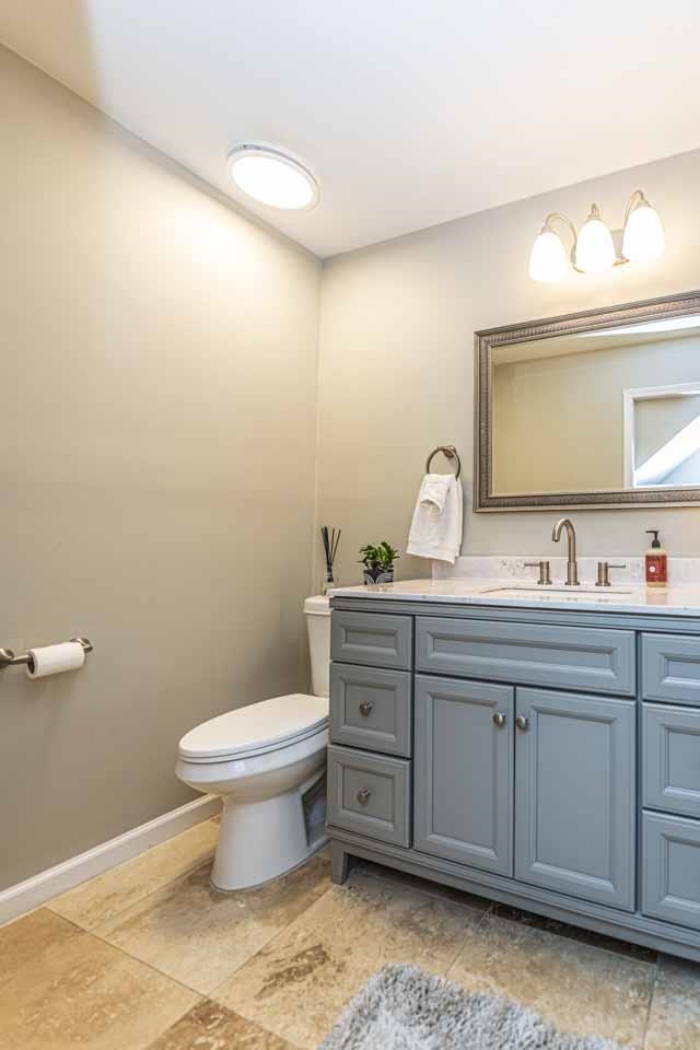 6910 Petworth Road, Unit 6910 Memphis, TN 38119 - Photo 16 of 37 a bathroom with a toilet sink and mirror