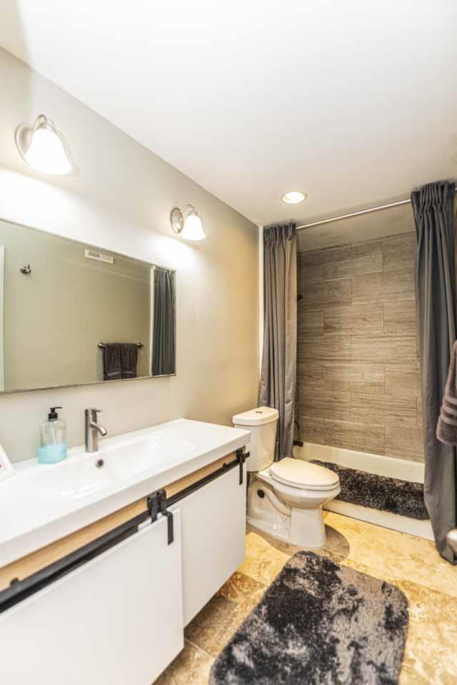 6910 Petworth Road, Unit 6910 Memphis, TN 38119 - Photo 25 of 37 a bathroom with a sink and a mirror