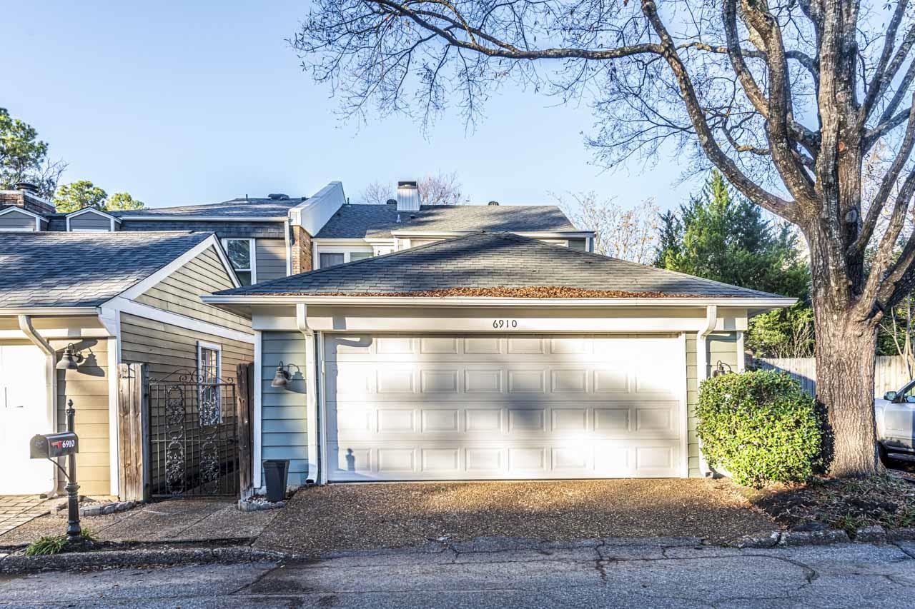 6910 Petworth Road, Unit 6910 Memphis, TN 38119 - Photo 3 of 37 a view of a house with a yard