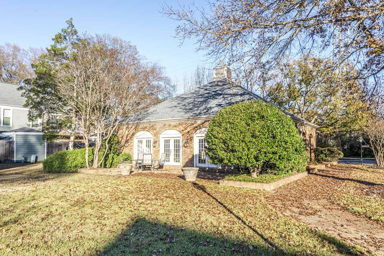 6910 Petworth Road, Unit 6910 Memphis, TN 38119 - Photo 37 of 37 a view of a yard with plants and trees