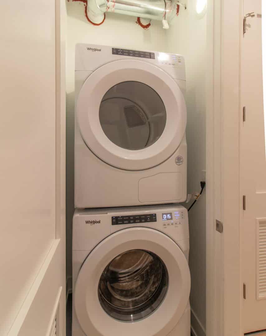 507 East 60th Street, Unit 1 Chicago, IL 60637 - Photo 13 of 15 a utility room with dryer and washer