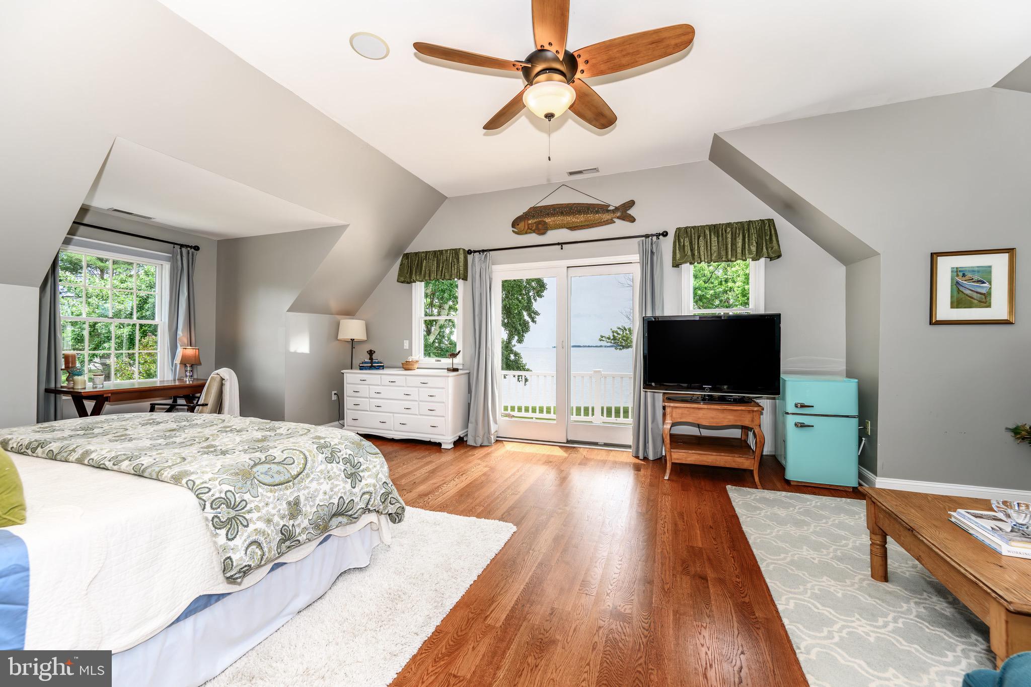 1606 Howard Road Chester, MD 21619 - Photo 25 of 54 a bedroom with a bed and a flat screen tv