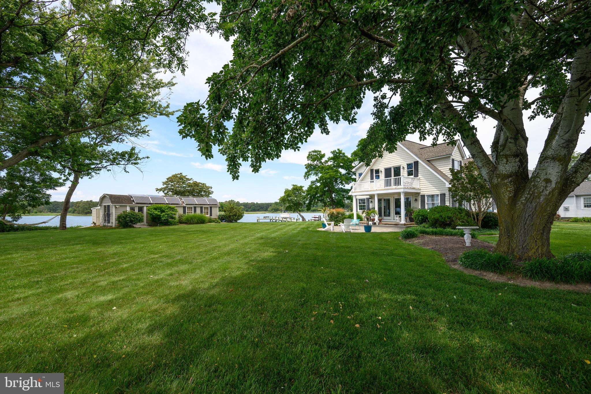 1606 Howard Road Chester, MD 21619 - Photo 36 of 54 a view of an house with backyard space and garden