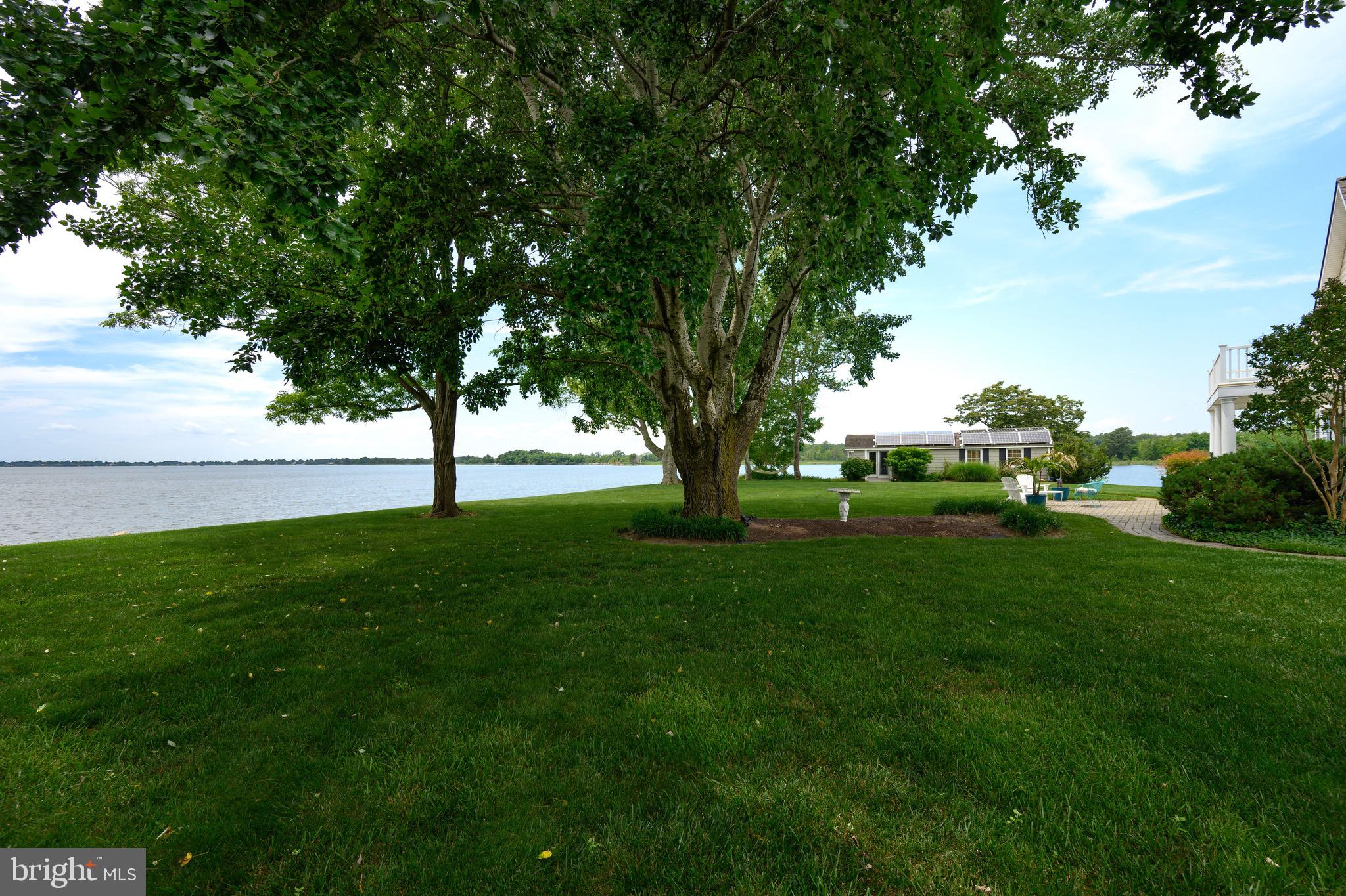 1606 Howard Road Chester, MD 21619 - Photo 45 of 54 a view of grassy field with benches