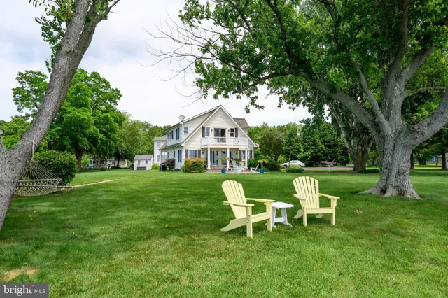 a lake view with a wooden deck and lake view