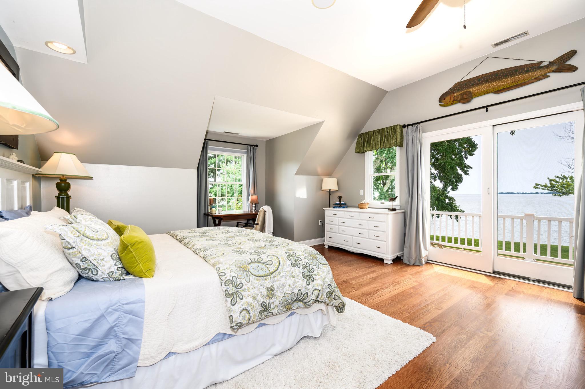 1606 Howard Road Chester, MD 21619 - Photo 5 of 54 a bedroom with a bed and wooden floor