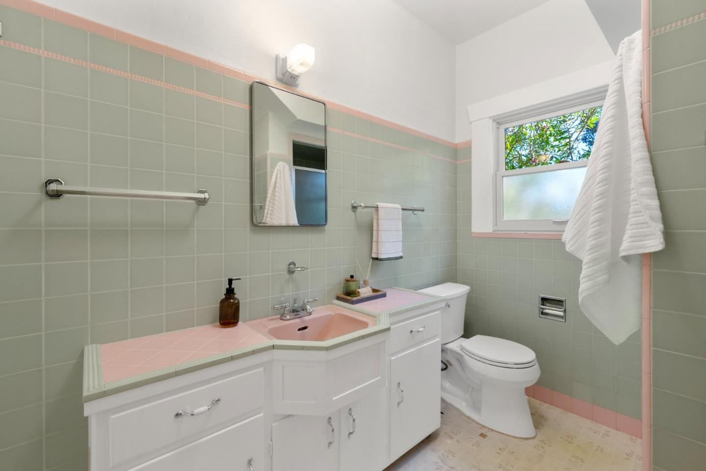 20724 Prospect Road Saratoga, CA 95070 - Photo 15 of 22 a bathroom with a sink toilet and shower