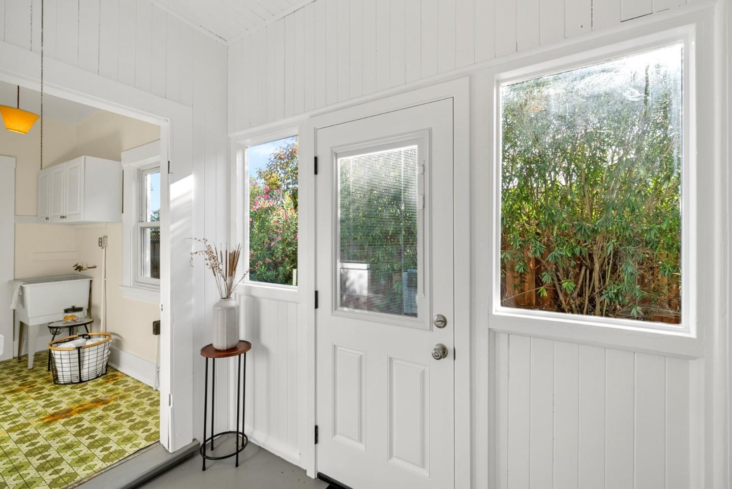 20724 Prospect Road Saratoga, CA 95070 - Photo 18 of 22 a view of a bedroom with wooden floor and windows