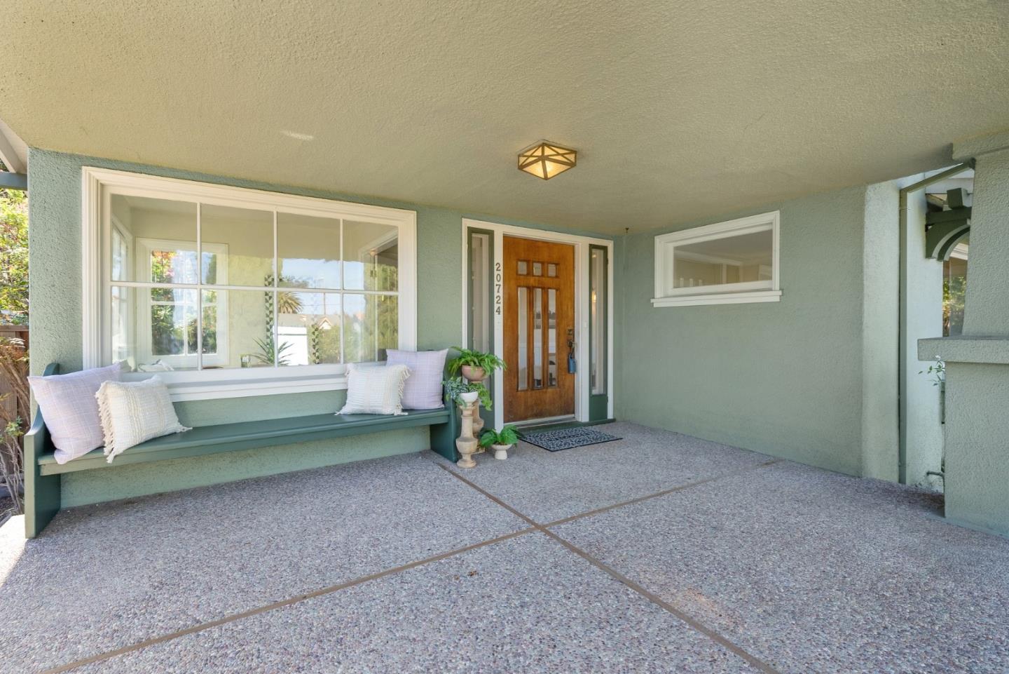 20724 Prospect Road Saratoga, CA 95070 - Photo 3 of 22 a room that has a bed and a window