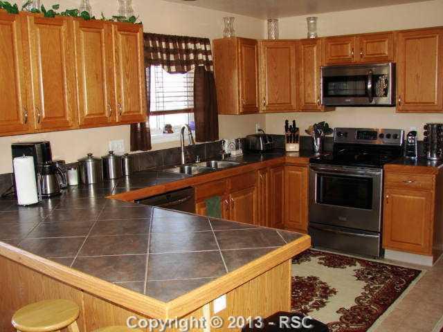 8539 Garrison Road Peyton, CO 80831 - Photo 2 of 24