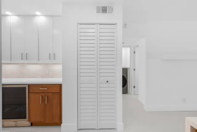 a bedroom with bed and window