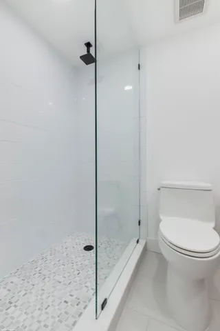 a view of a city with an ocean