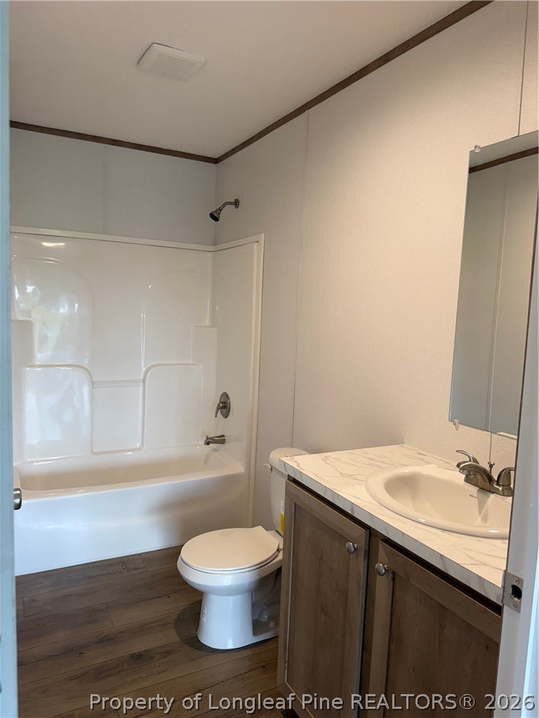 866 Roberta Road Fairmont, NC 28340 - Photo 15 of 16 a bathroom with a sink a toilet and shower