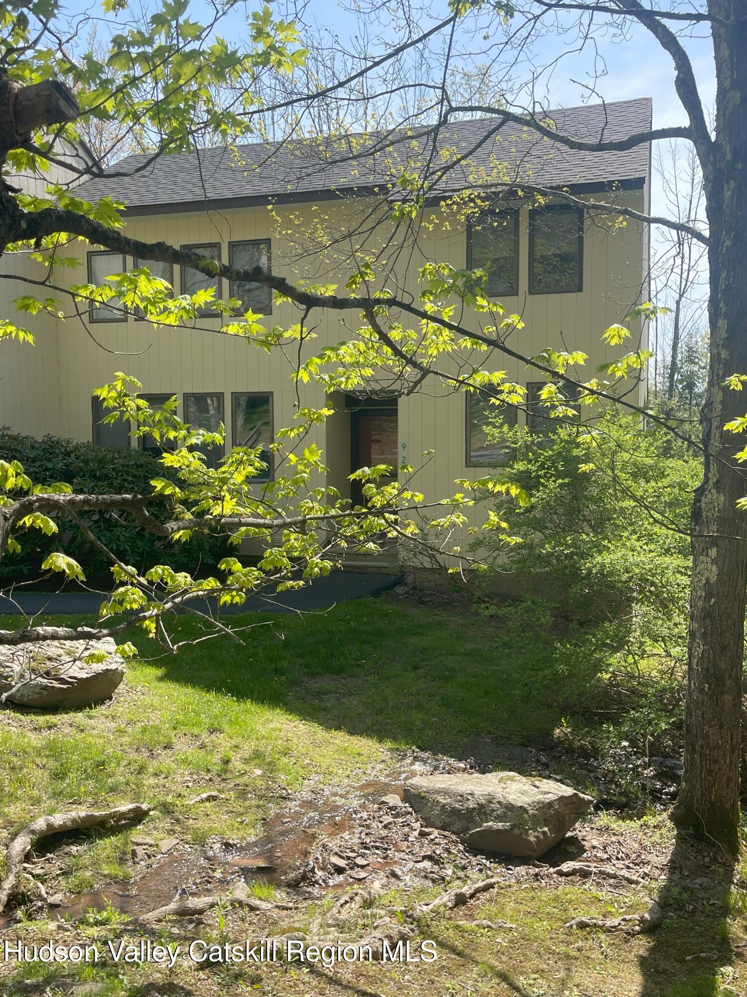 270 Pines Drive, Unit 92 Roxbury, NY 12421 - Photo 2 of 31 a view of a house with a fountain