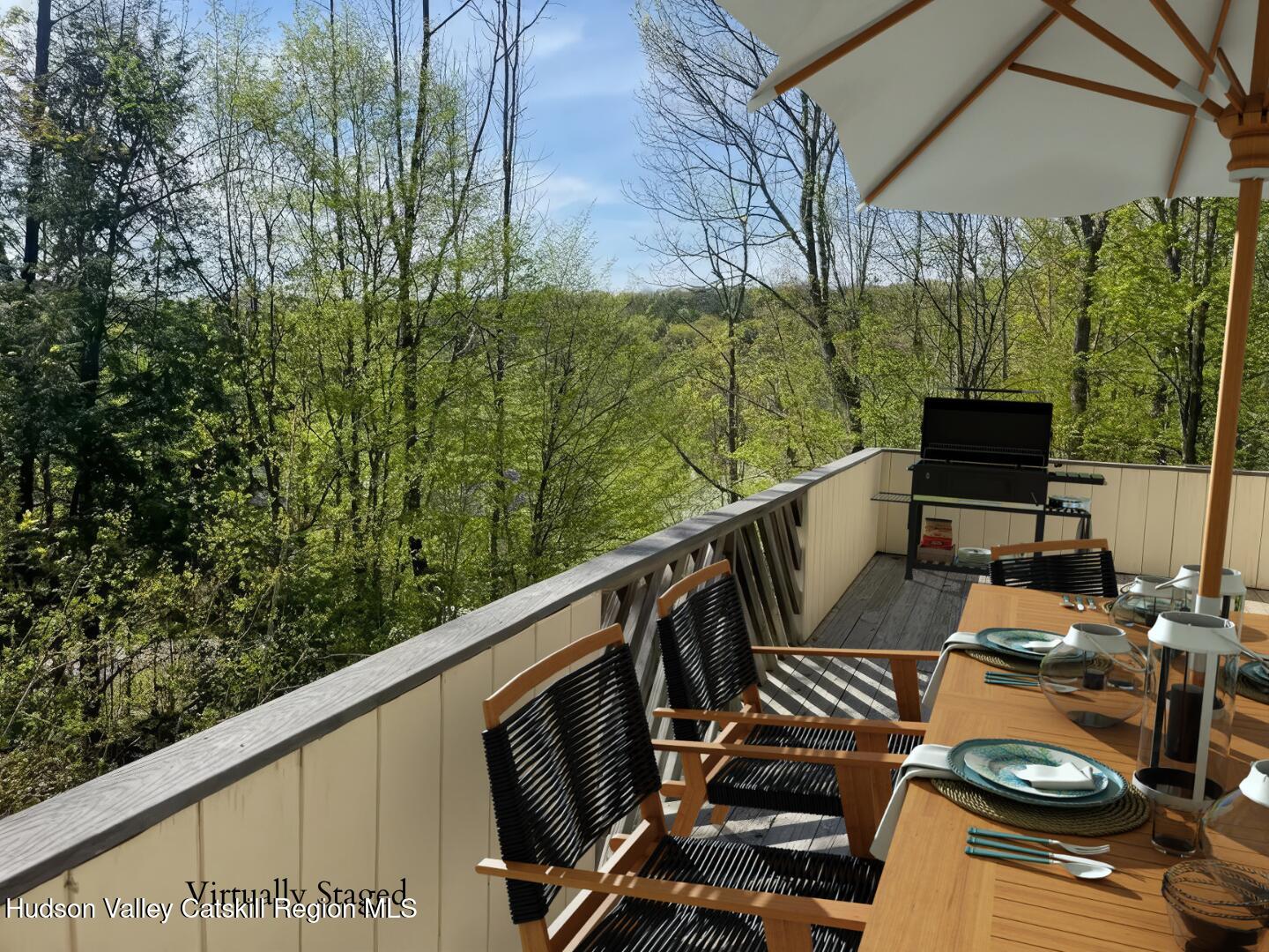 270 Pines Drive, Unit 92 Roxbury, NY 12421 - Photo 25 of 31 a view of balcony with furniture and garden