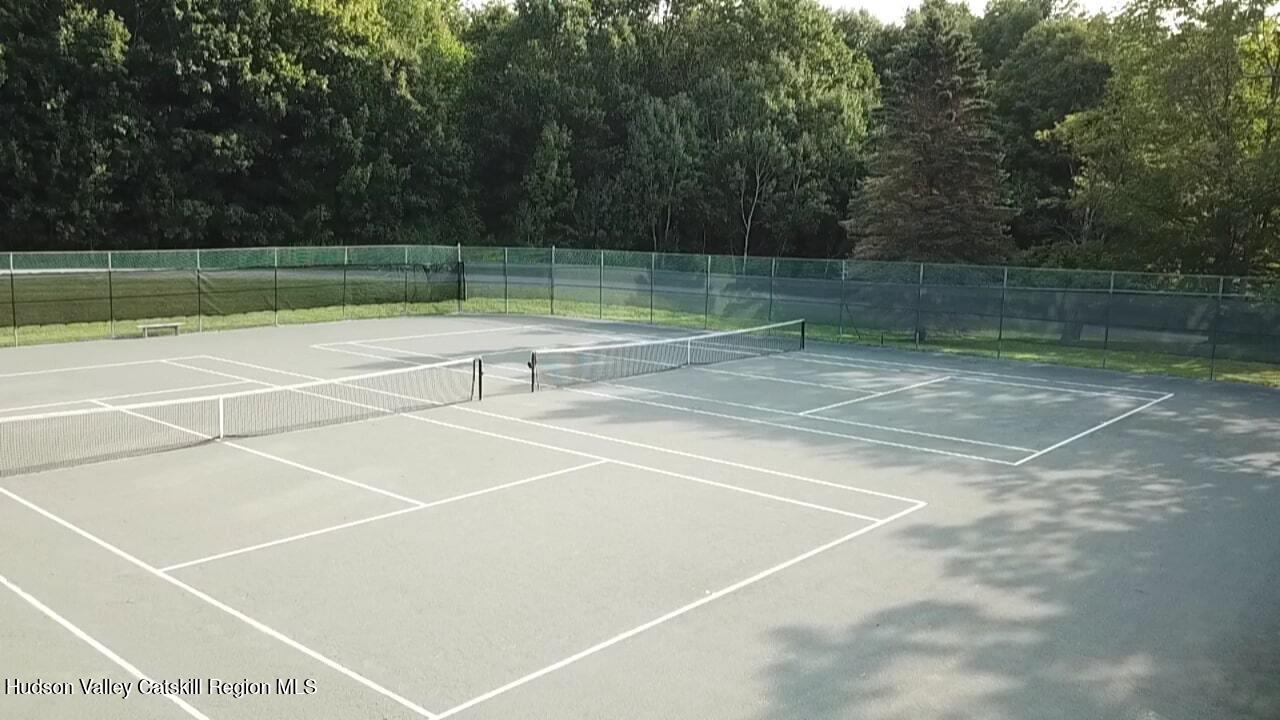 270 Pines Drive, Unit 92 Roxbury, NY 12421 - Photo 30 of 31 a view of a tennis court
