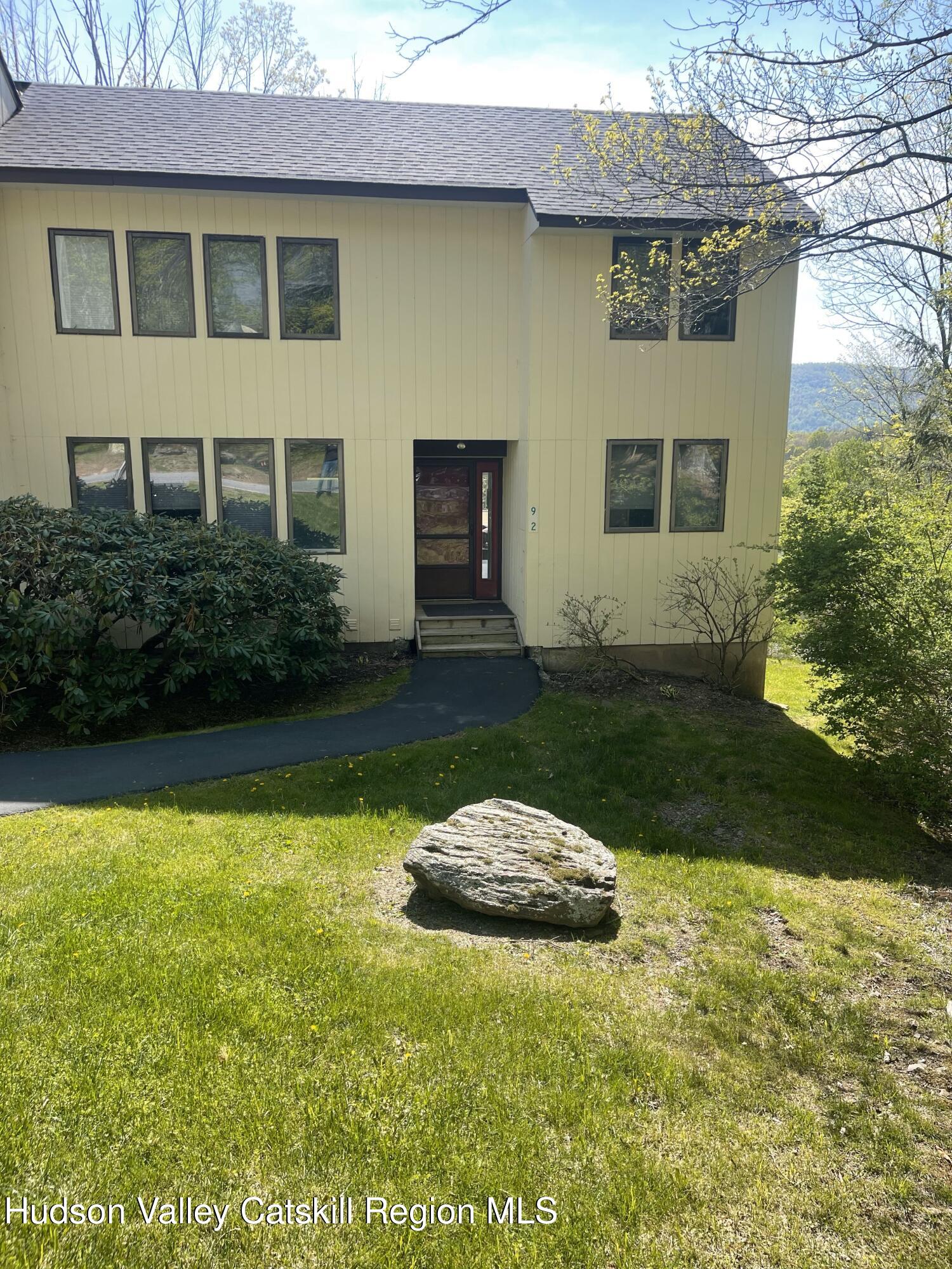 270 Pines Drive, Unit 92 Roxbury, NY 12421 - Photo 31 of 31 a view of a house with backyard and garden