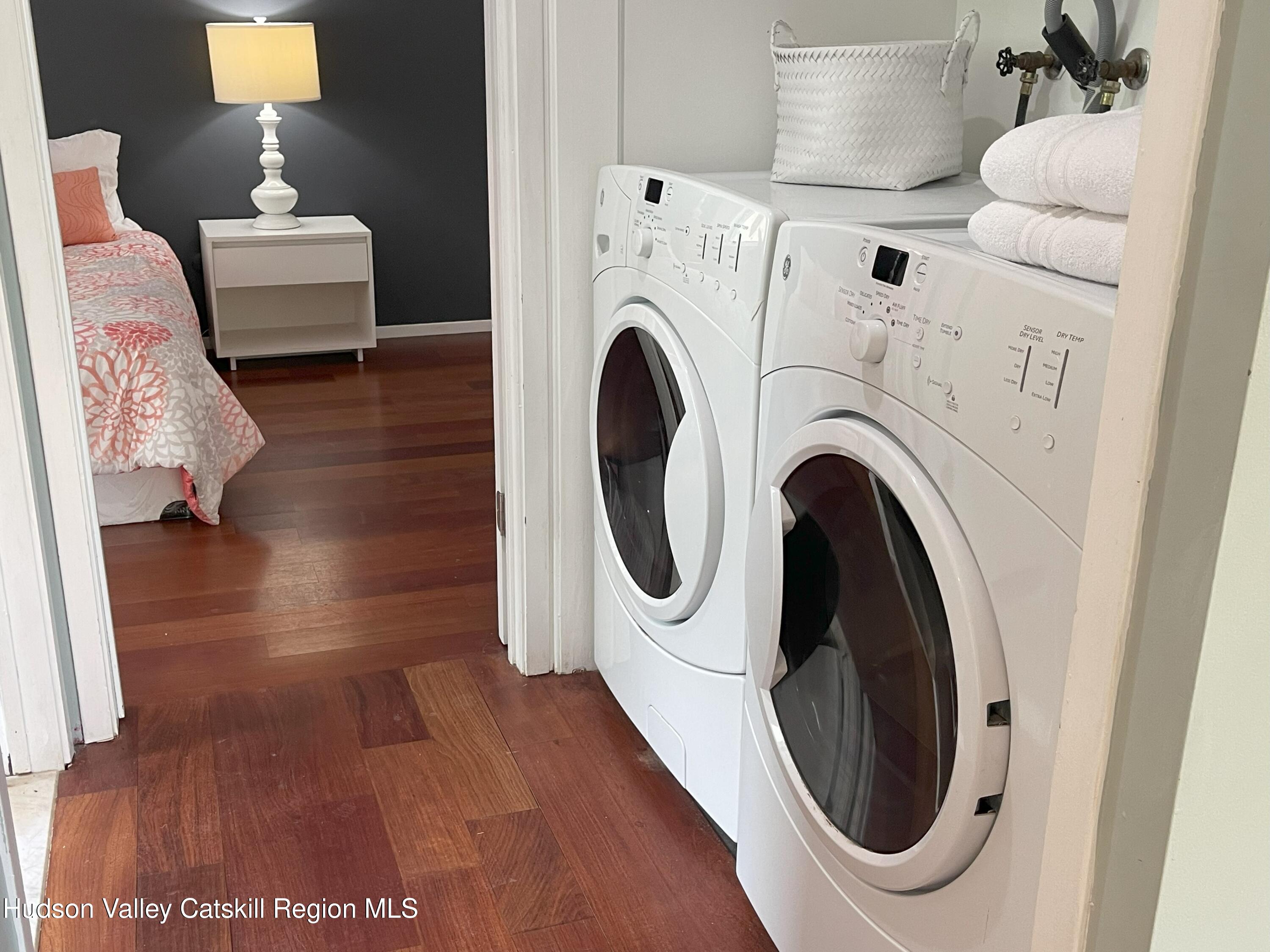 270 Pines Drive, Unit 92 Roxbury, NY 12421 - Photo 10 of 31 a utility room with dryer and washer