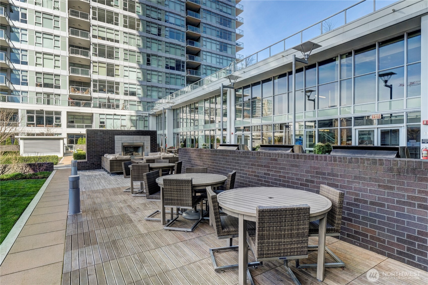 583 Battery Street, Unit 704N Seattle, WA 98121 - Photo 26 of 36 a backyard of a house with outdoor seating